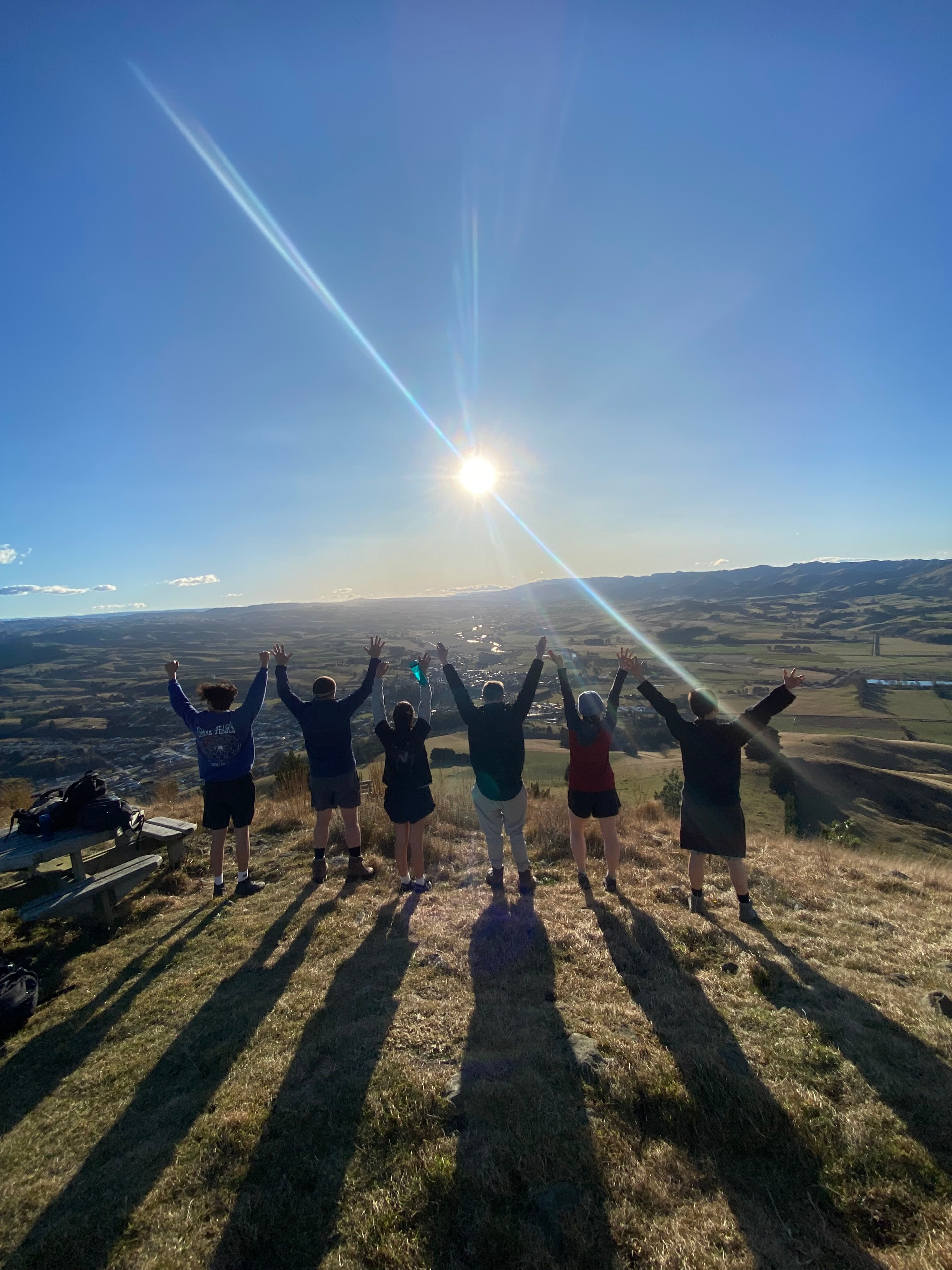 Group of young people celebrating outdoors in Central Otago